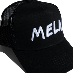 White on Black Mela Trucker Hat